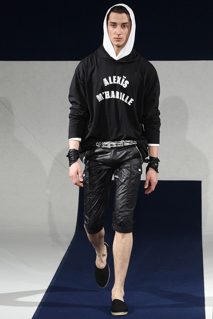 black hoodie and leather shorts