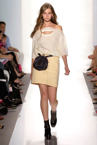 white off-shoulder top with beige pencil skirt