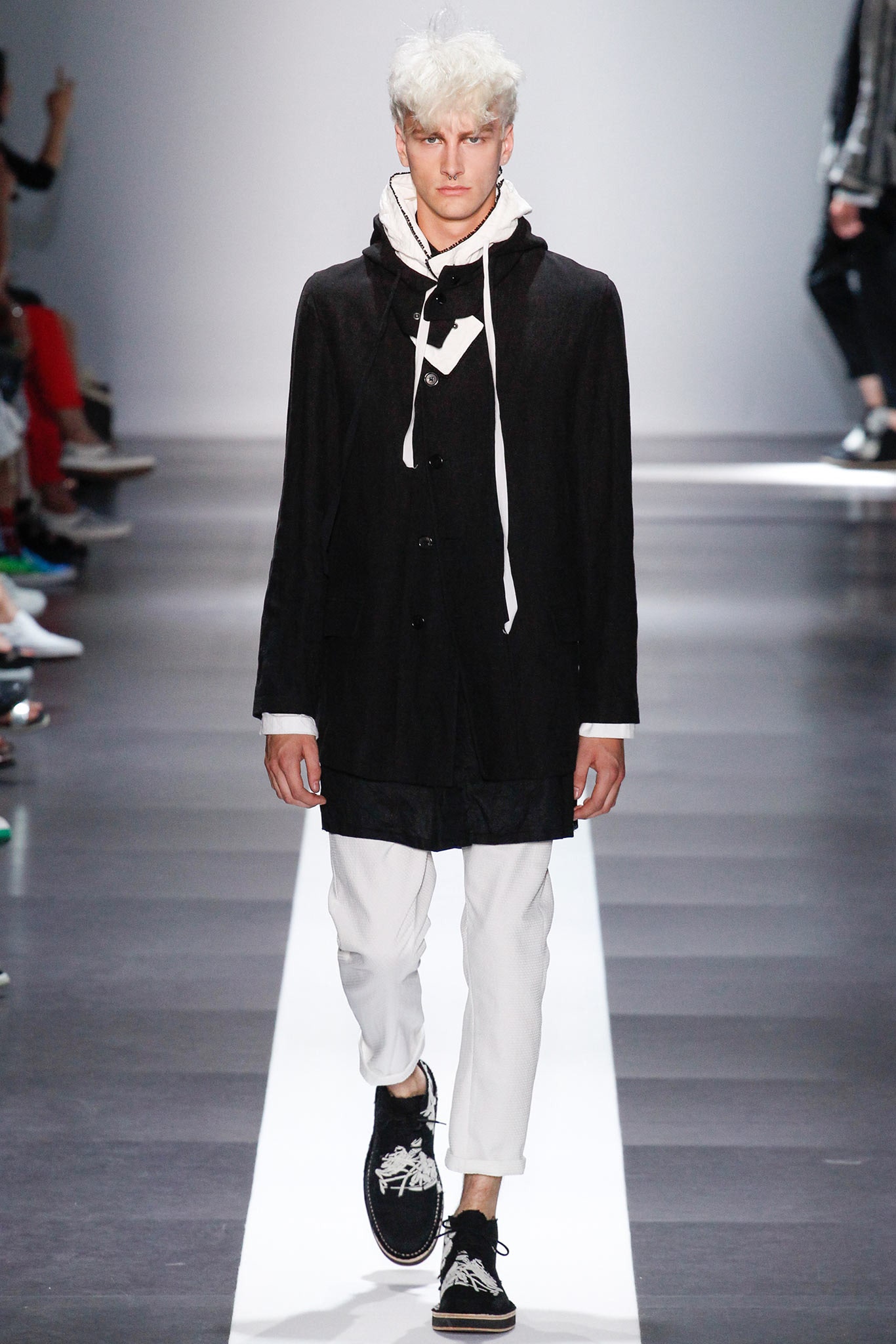 black relaxed jacket with white pants