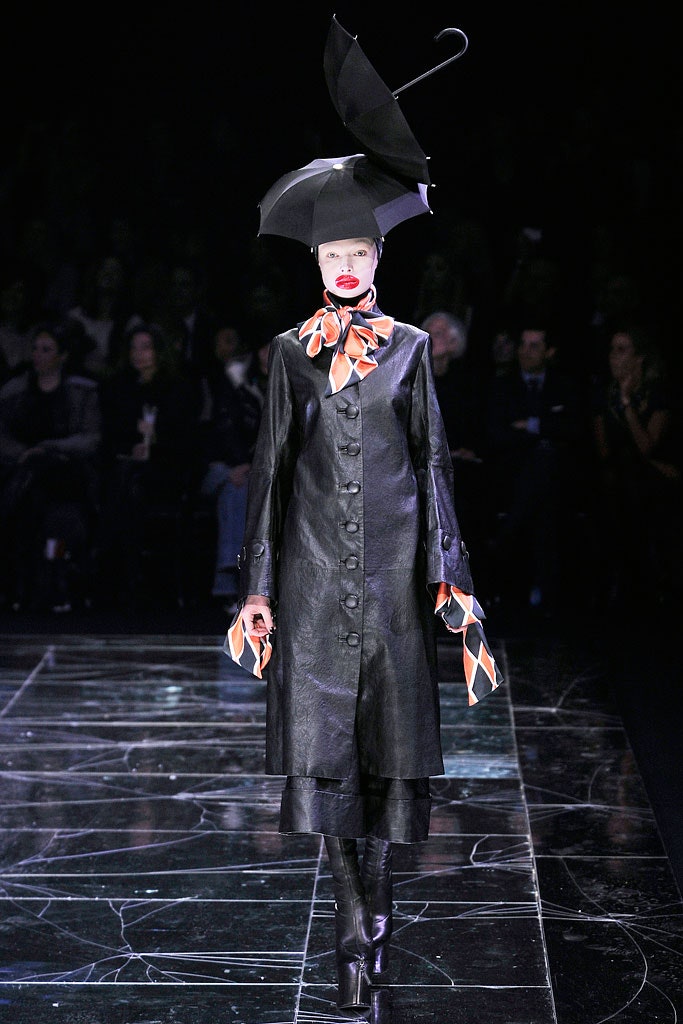 black leather fitted coat with hat