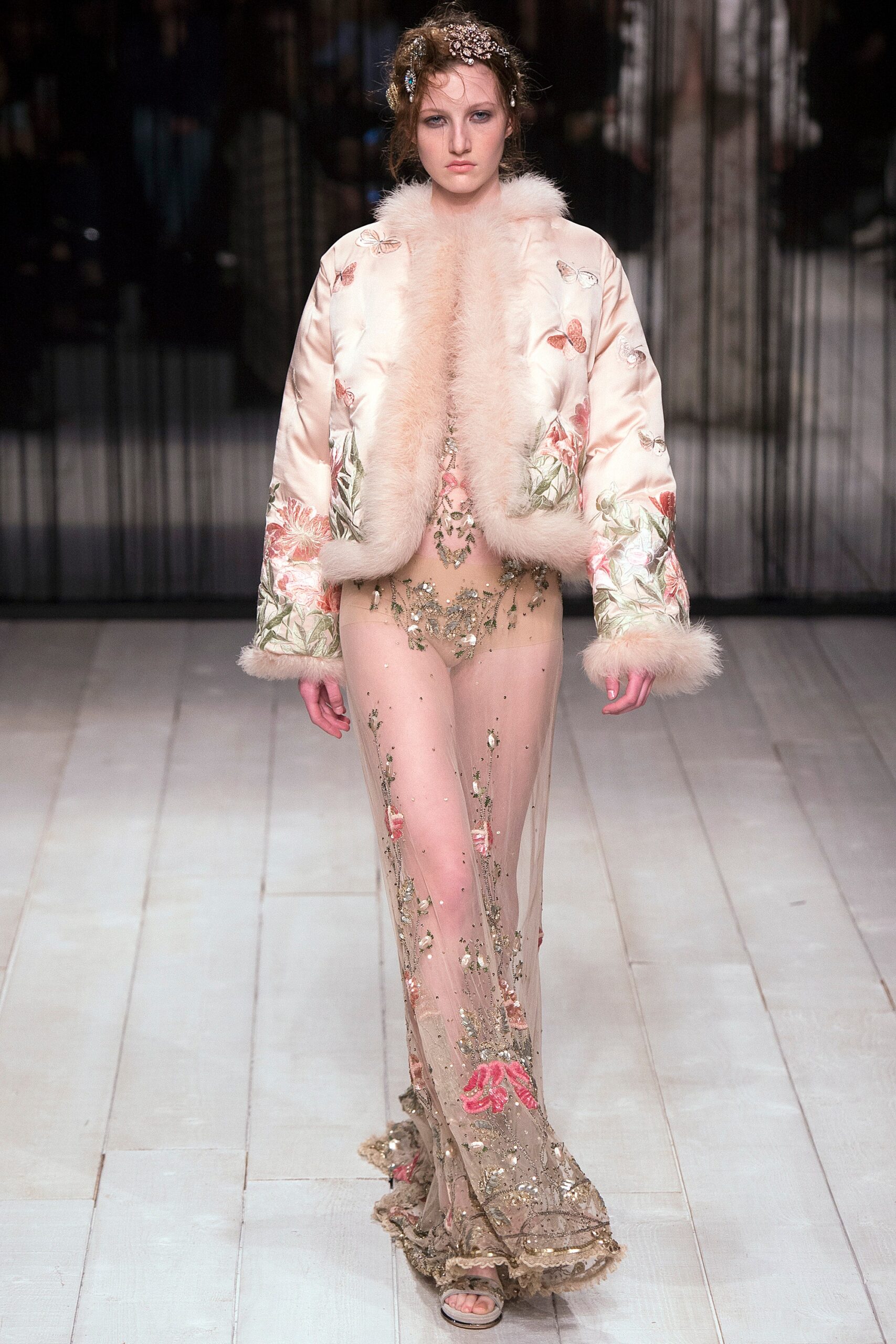 pink embroidered coat and beige gown