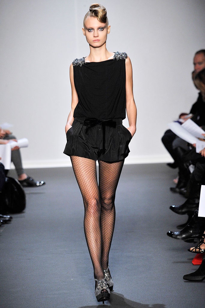 black silk sleeveless high-neck fitted draped top