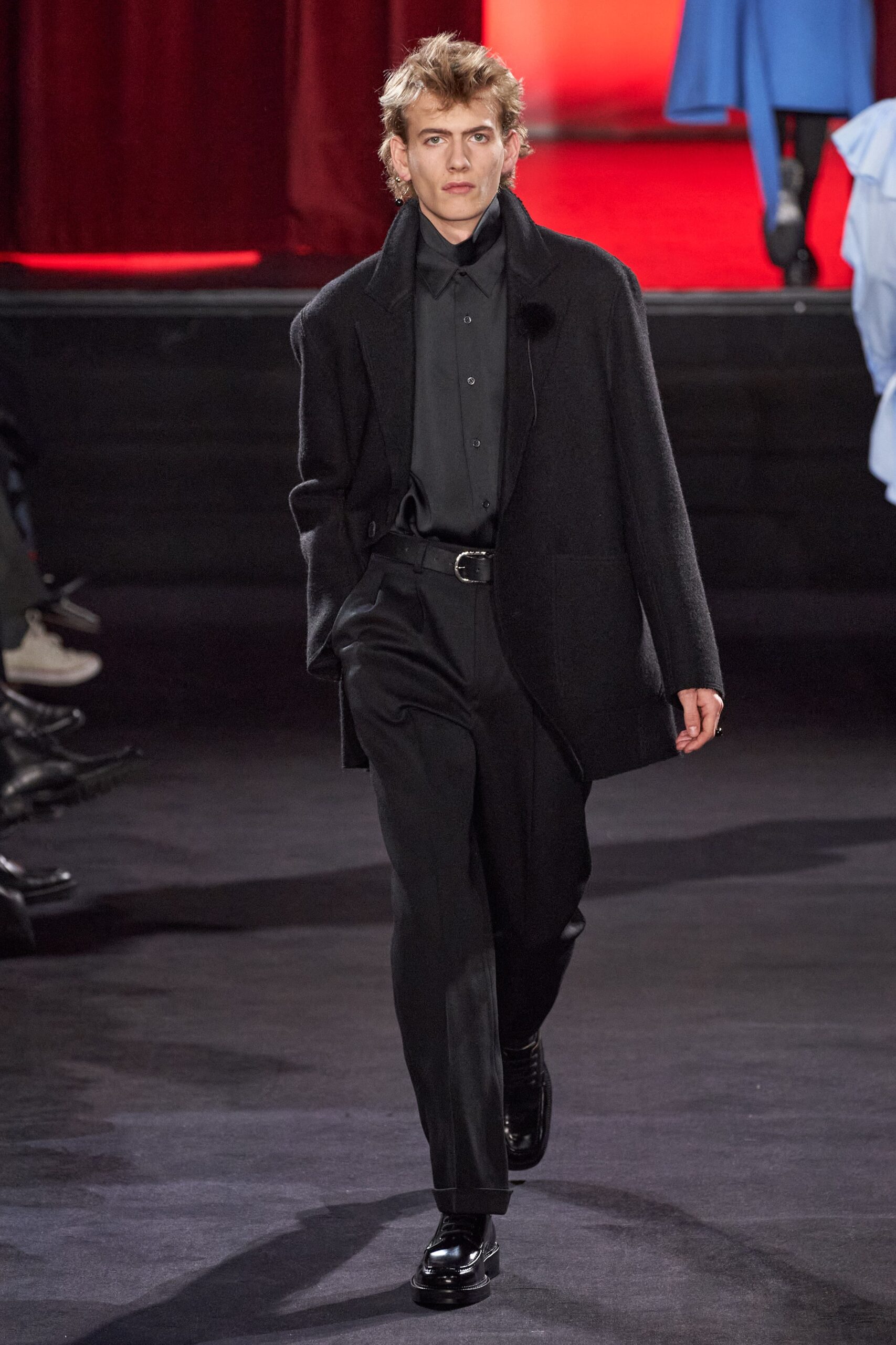 black wool coat with tailored pants