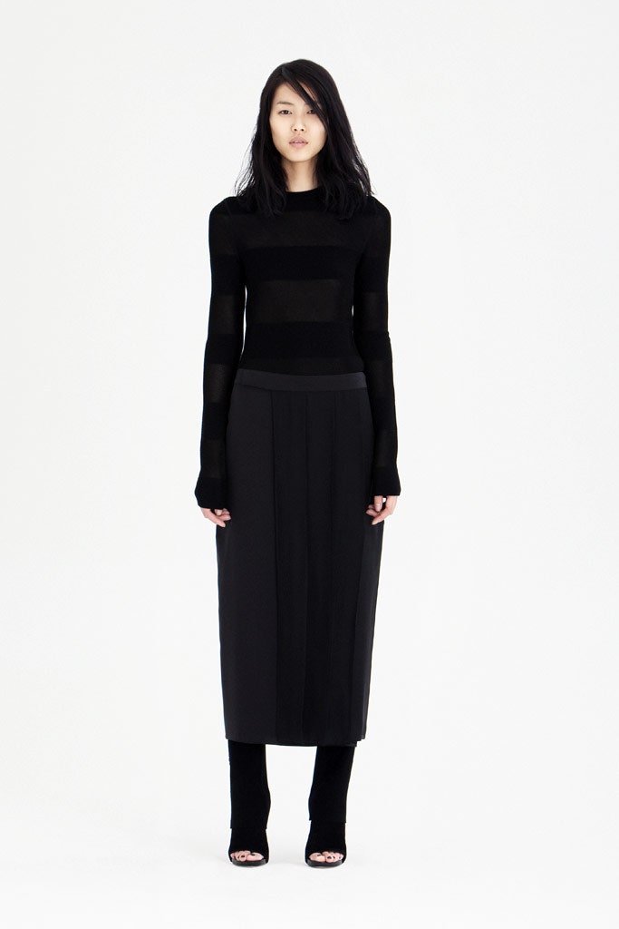 black fitted top and pleated skirt