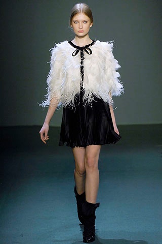 white feather top and black dress