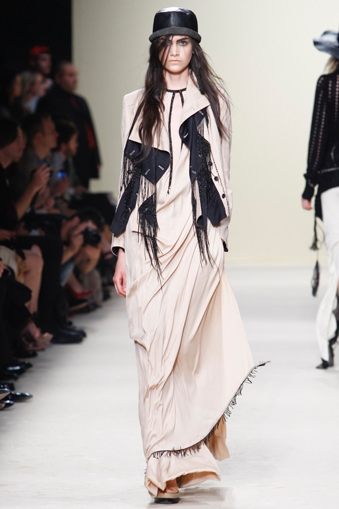 beige draped maxi dress with black jacket