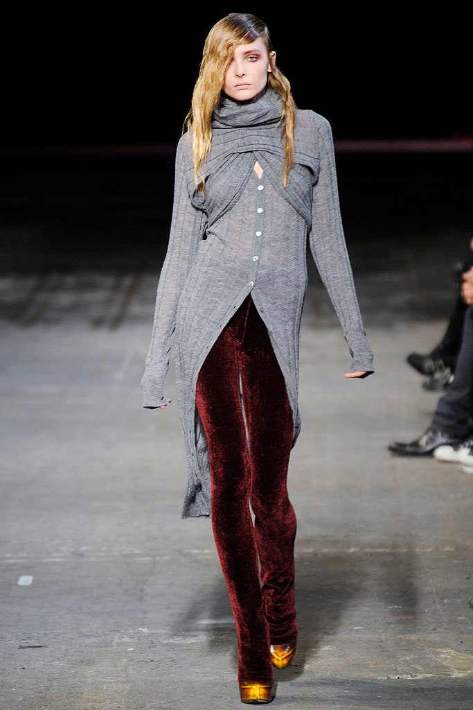 gray relaxed top with red velvet pants