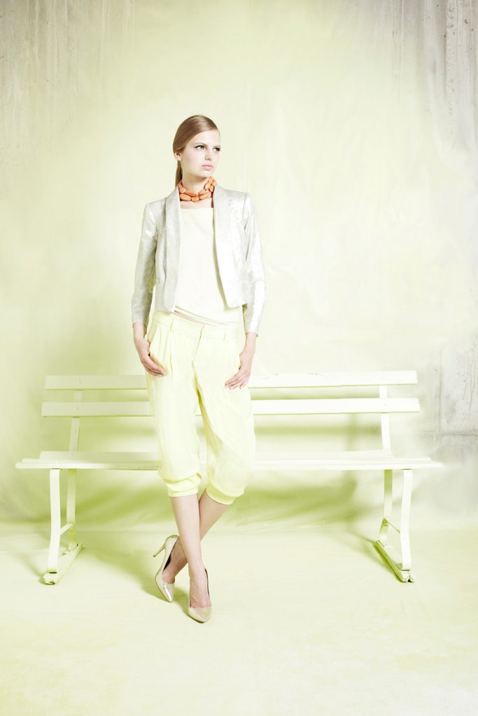 silver tailored jacket with yellow pants
