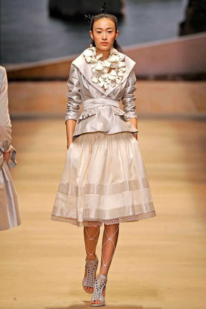 silver silk structured jacket with beige tiered skirt