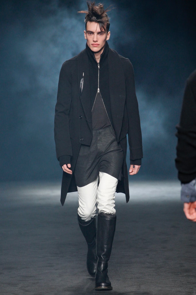 black wool coat with white pants