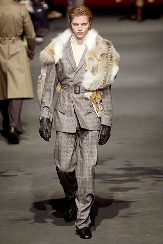 gray tailored suit with fur cape
