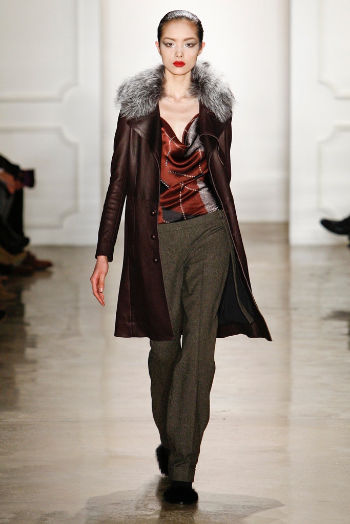 brown leather coat with red top