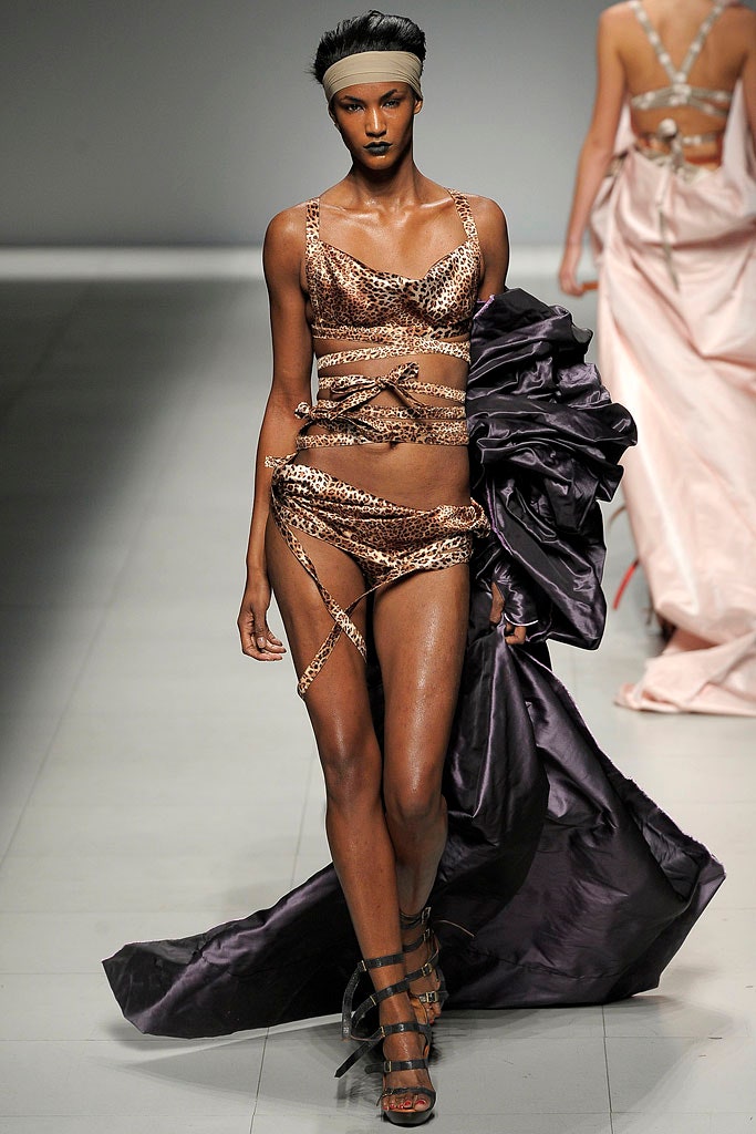 brown gold animal-print bikini with purple coat