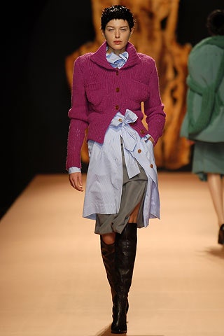 purple cardigan with gray skirt