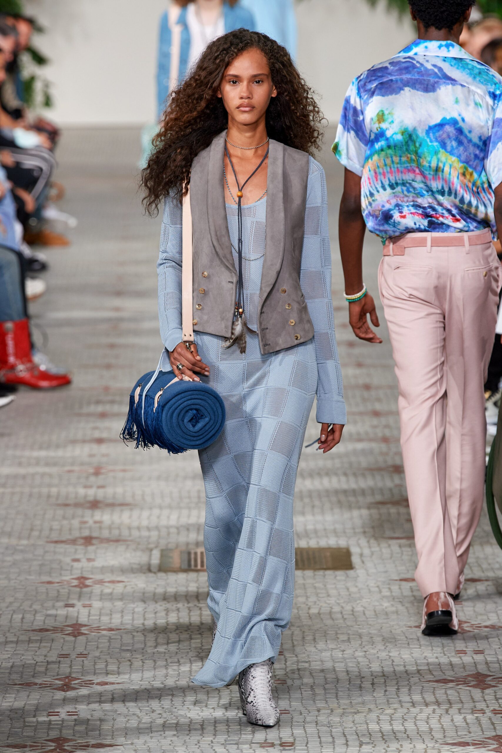 blue fitted maxi dress with gray vest