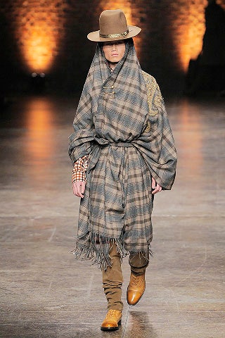 gray wool poncho with brown pants