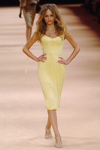 yellow pleated sleeveless dress
