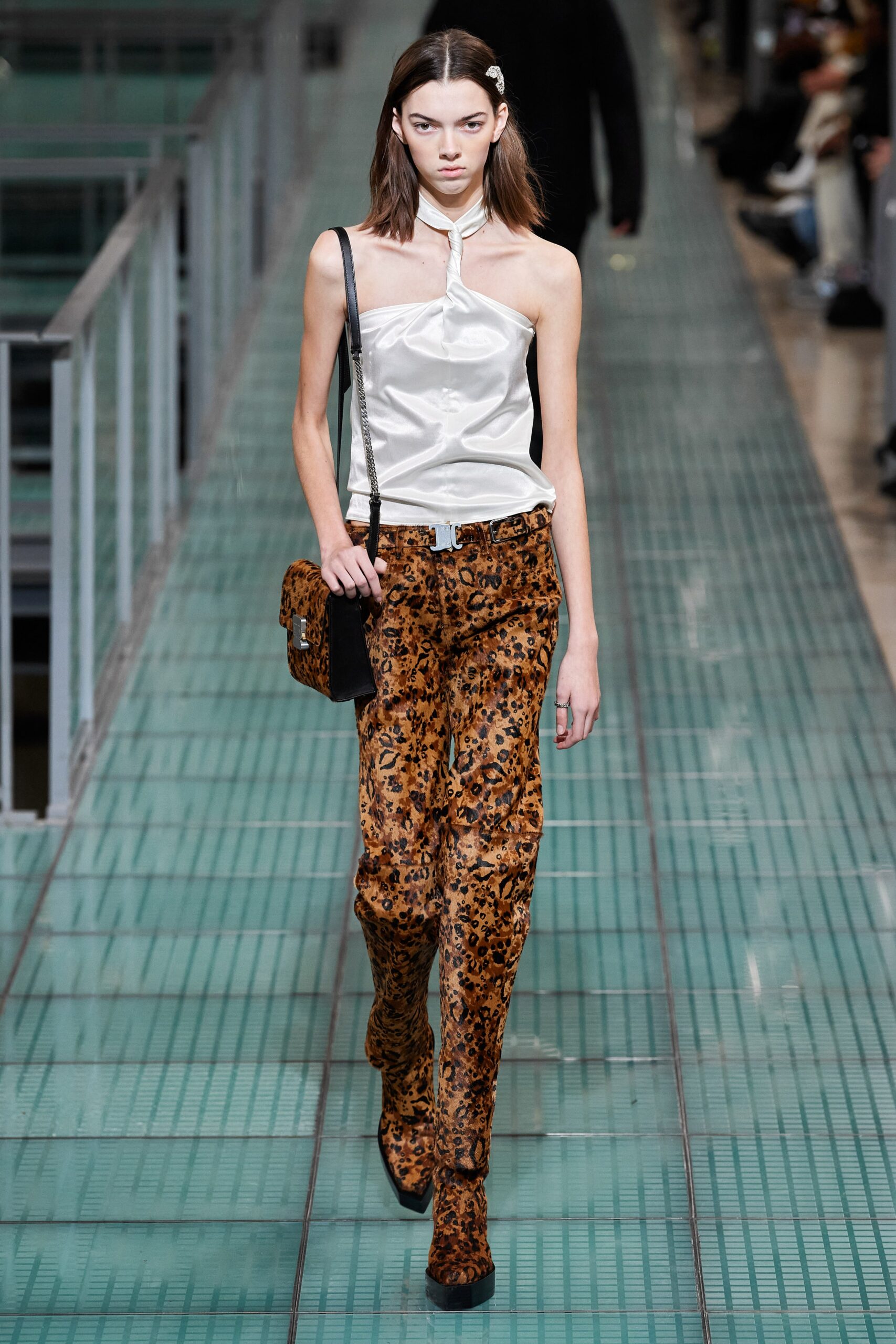 fitted white silk top and brown animal-print pants