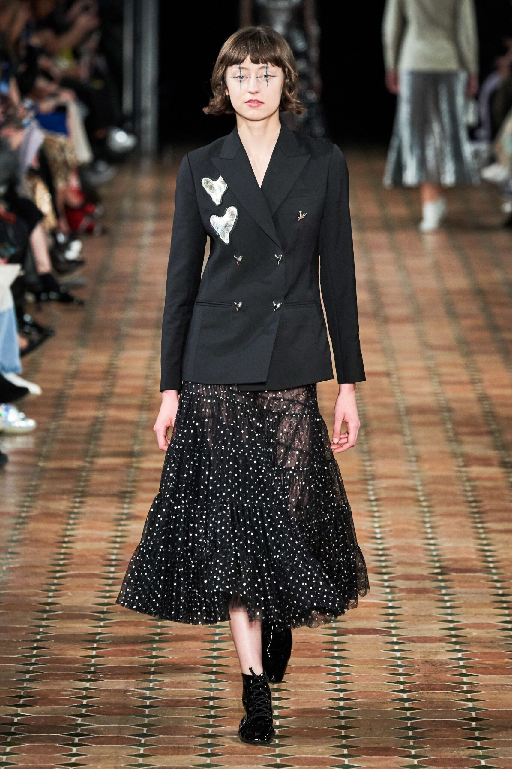black tailored blazer and lace skirt
