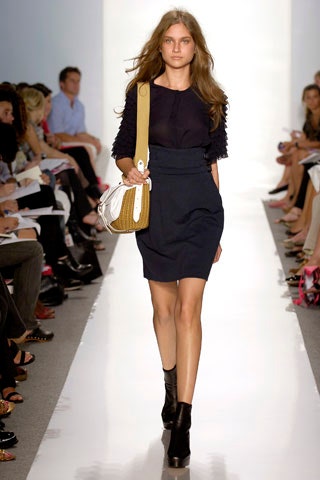 black fitted mini dress with bag
