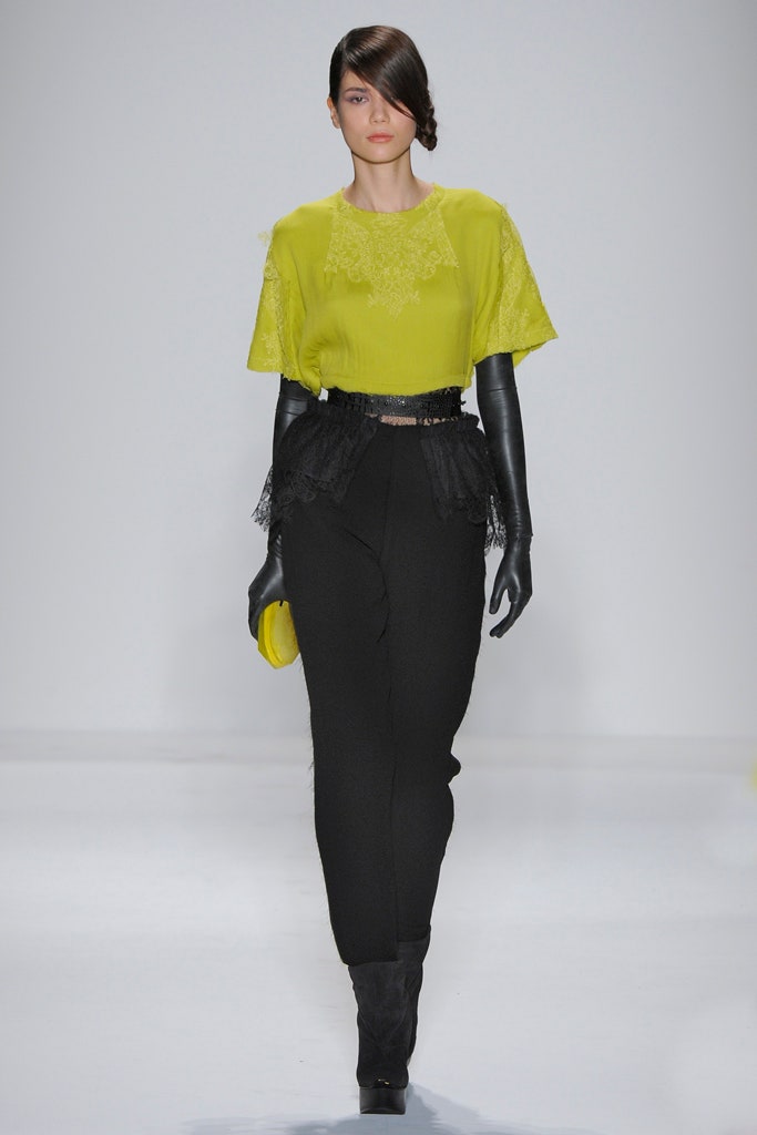 yellow silk top with black pants