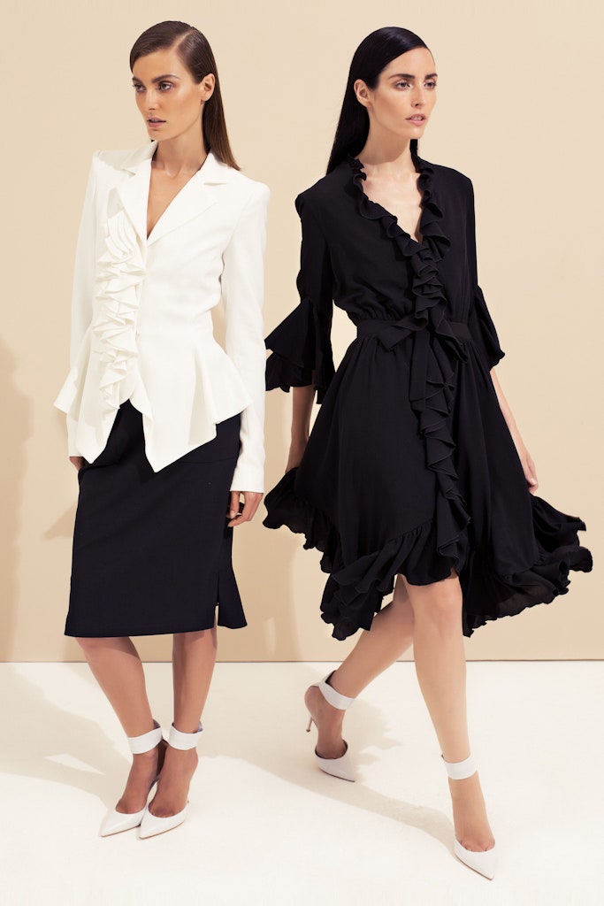 white ruffled blazer and black dress