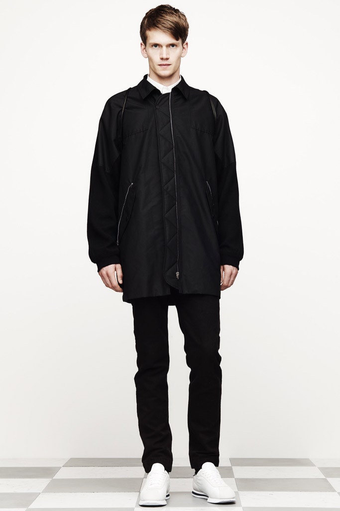 black cotton long-sleeve collared relaxed zippered coat
