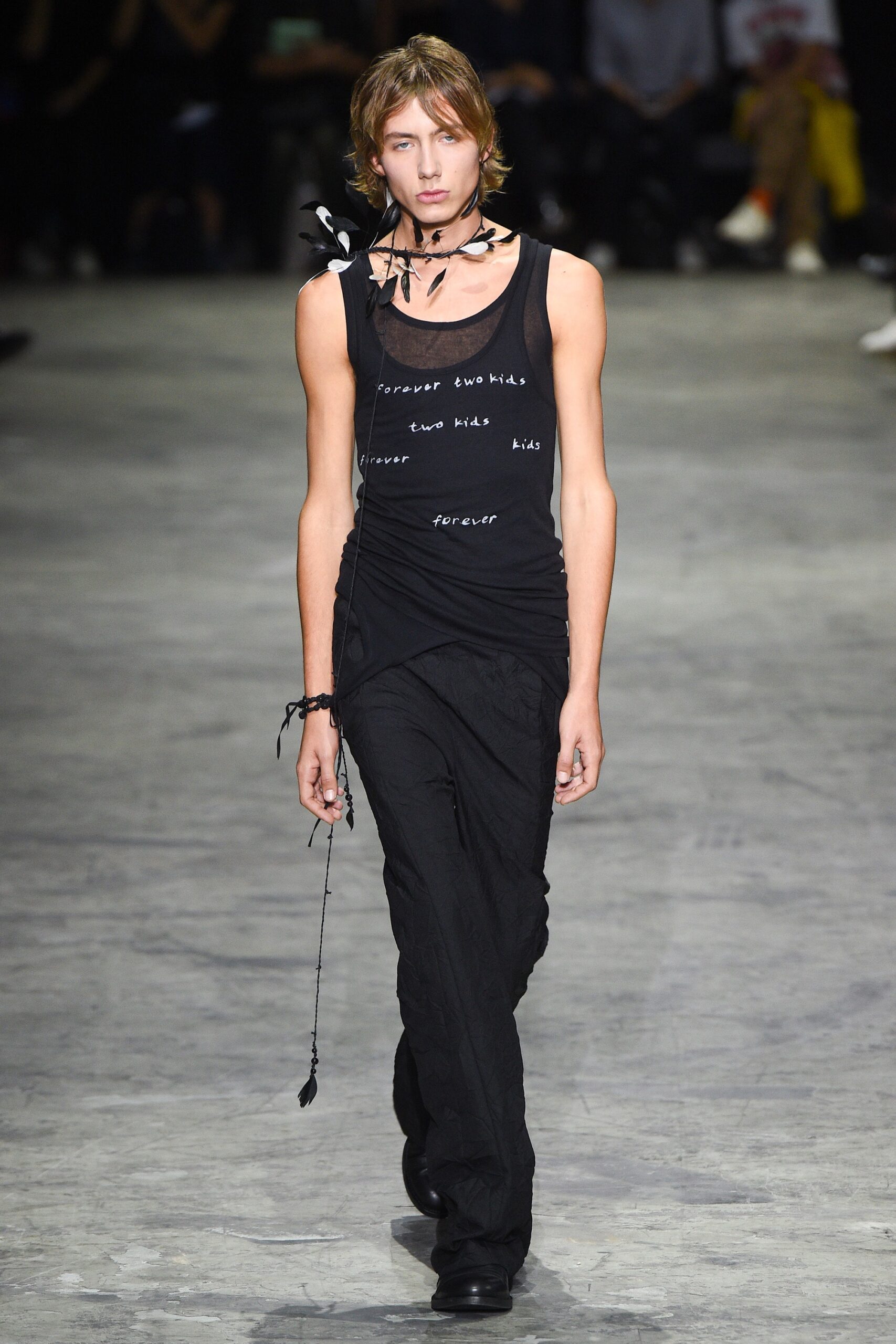 black fitted tank-top and relaxed pants