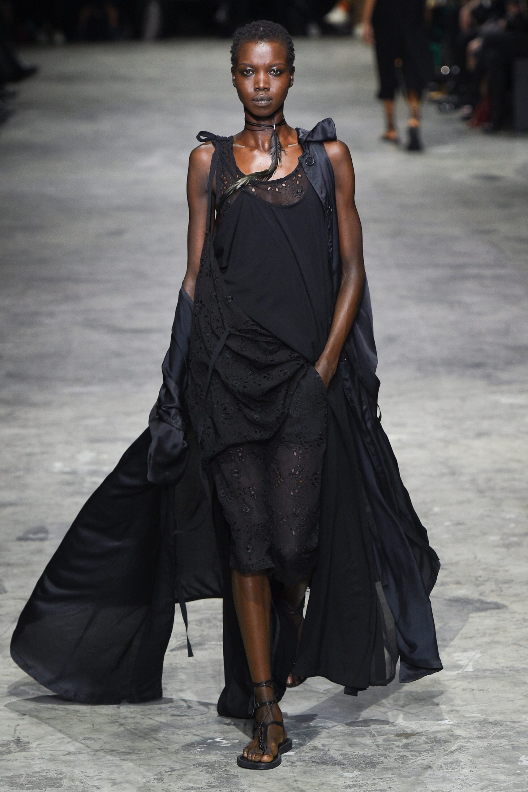 black flowing midi dress and cape