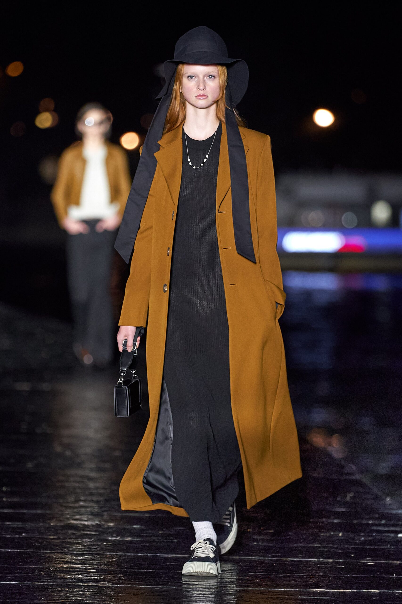 brown wool relaxed coat with black dress