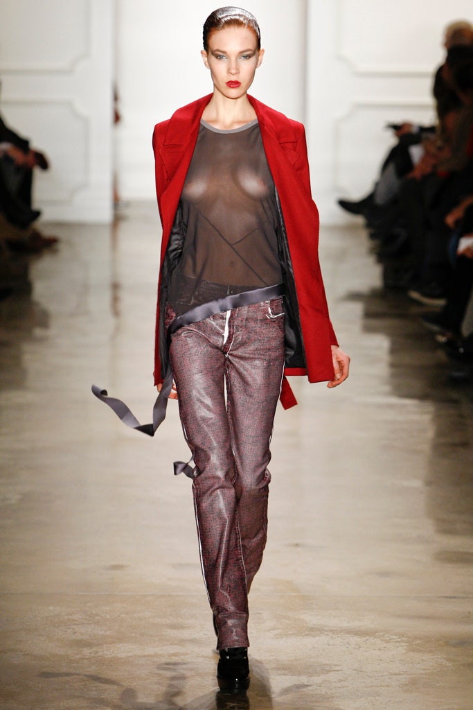 red tailored coat with sheer top