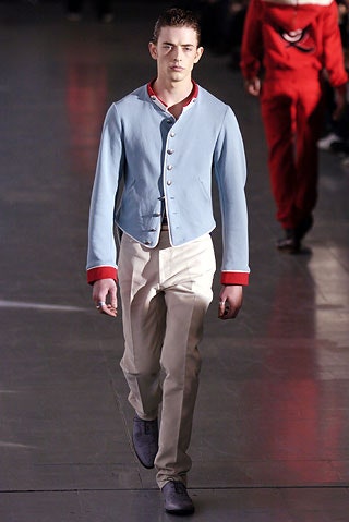 blue cotton fitted jacket with beige pants