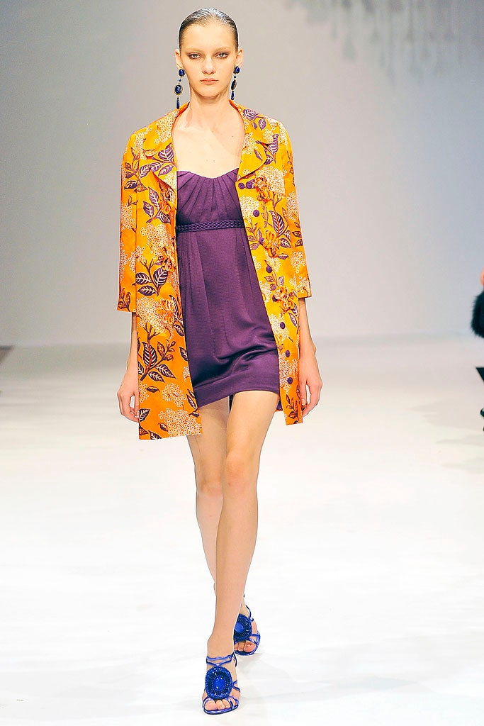 purple fitted dress with yellow coat