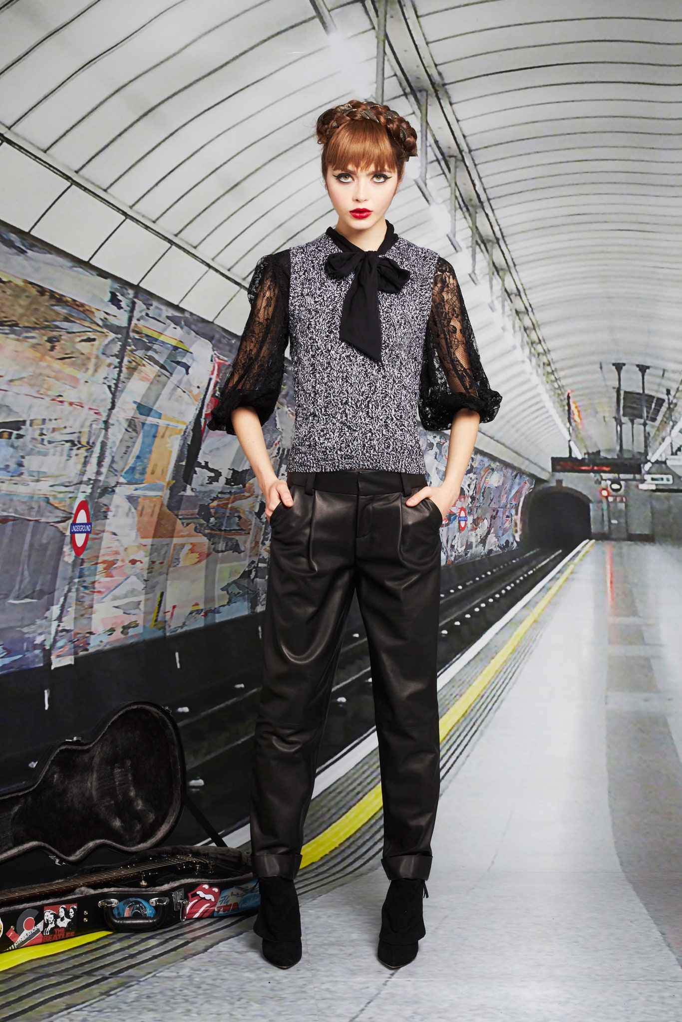 black leather tailored pants with gray top