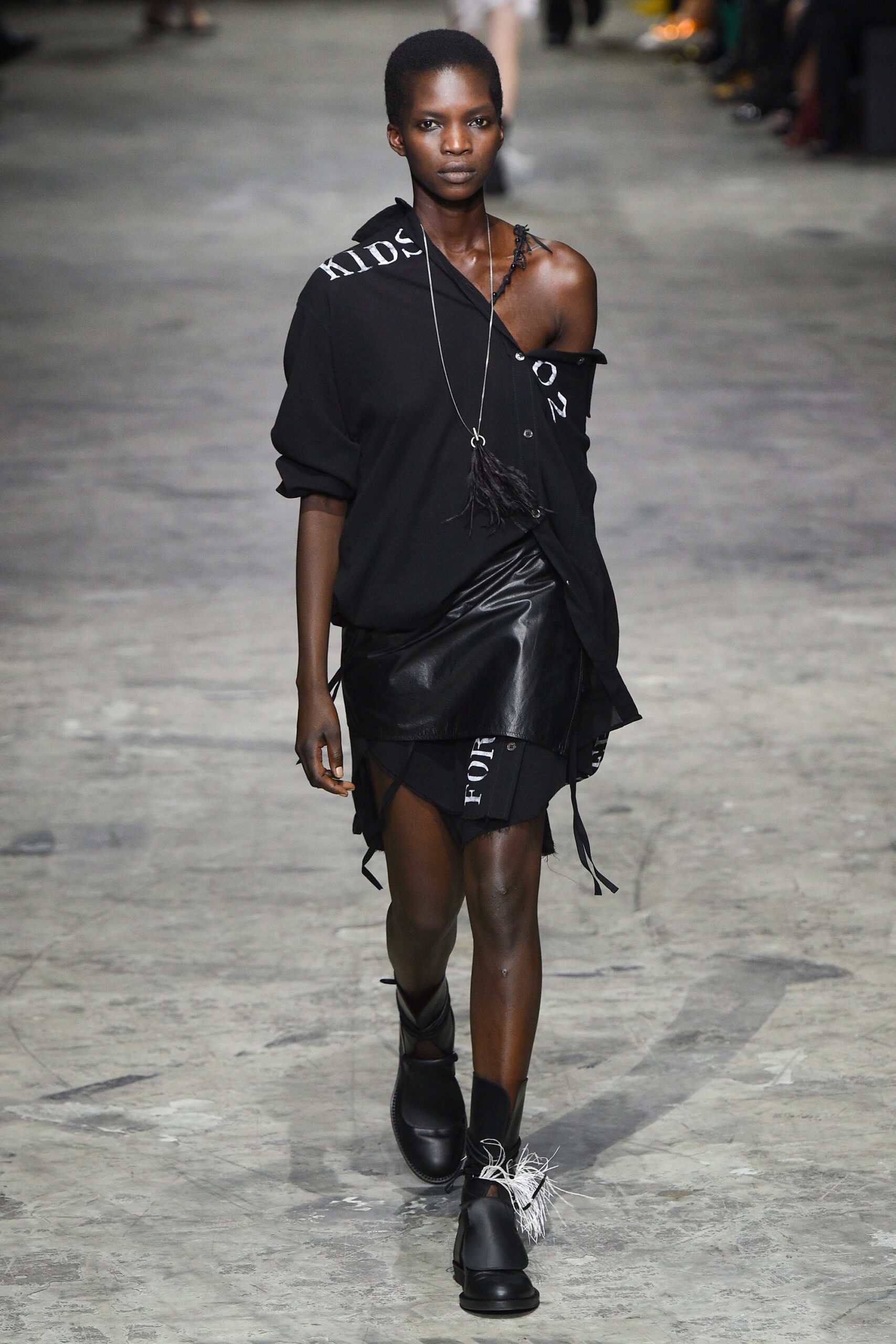 black relaxed top and fitted skirt