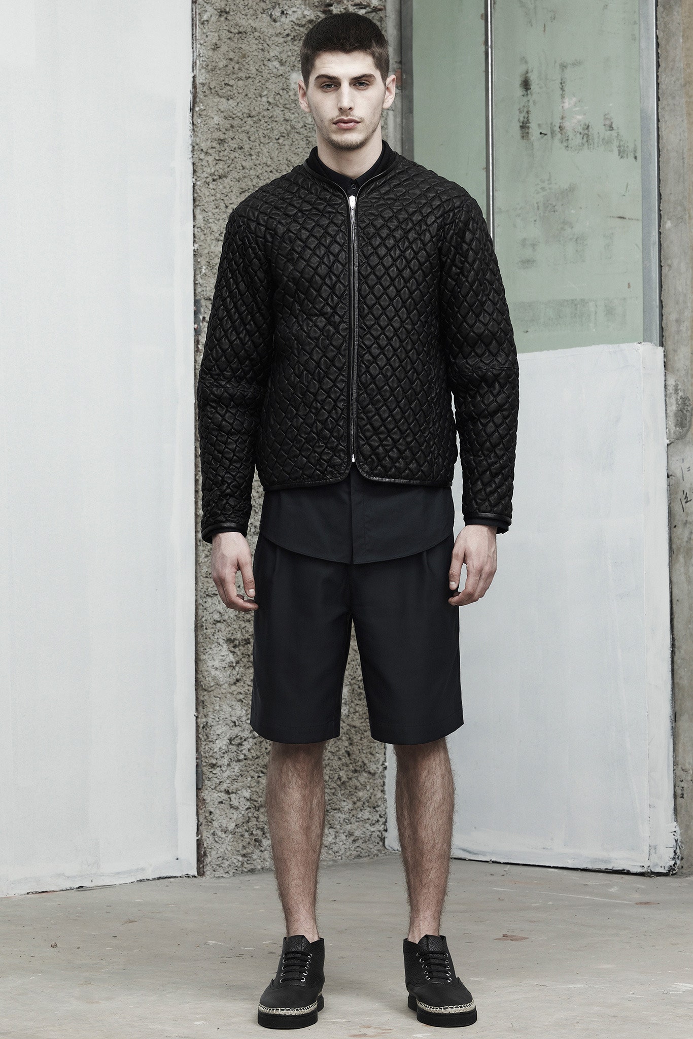 black quilted jacket and shorts