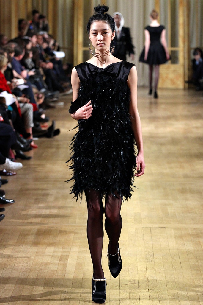 black feathered sleeveless dress