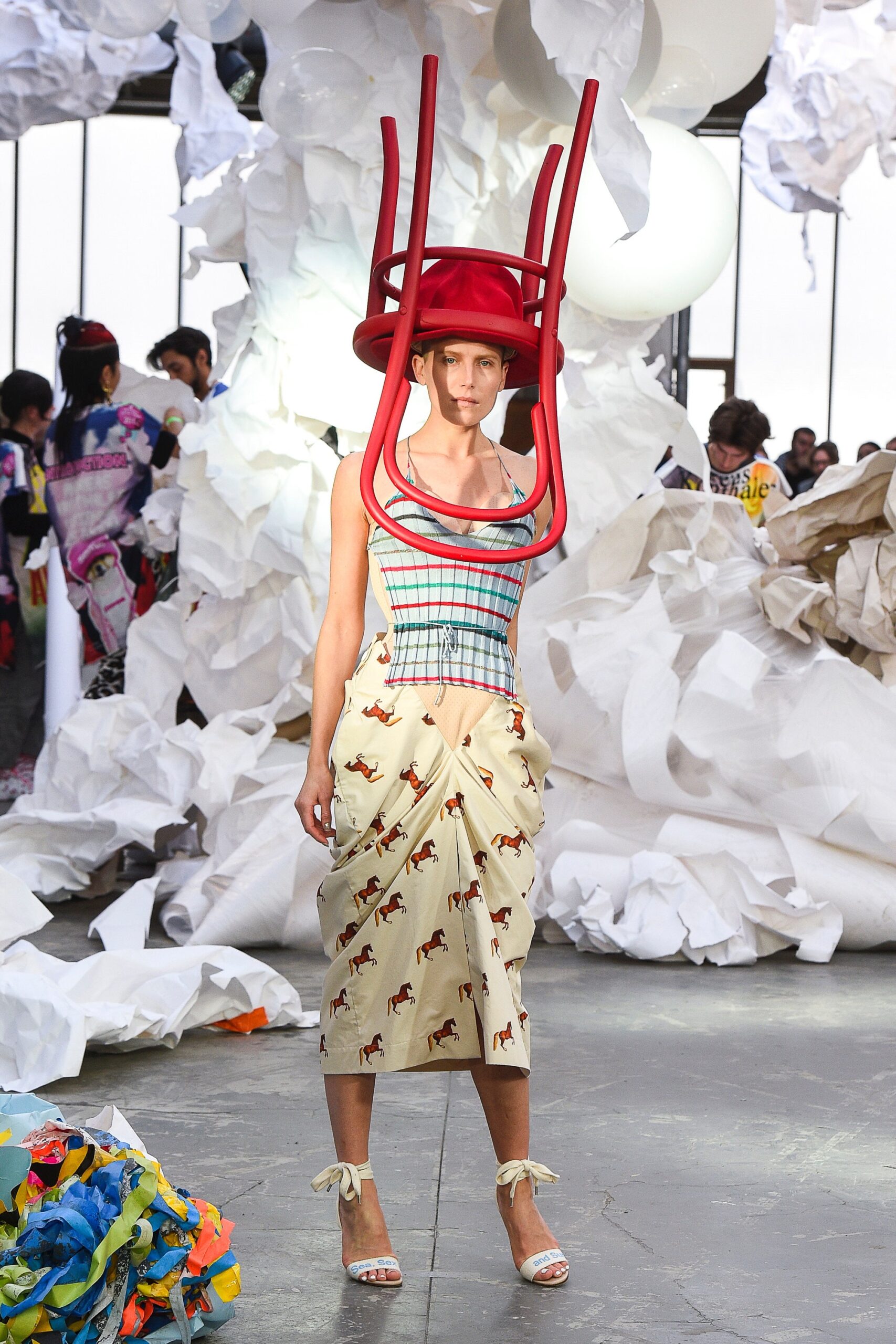multi-colored fitted top with beige midi skirt