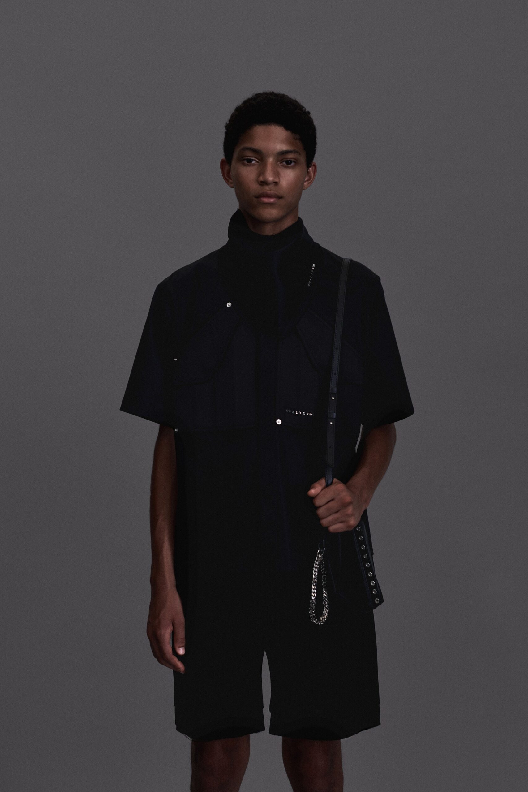 black fitted shirt and shorts
