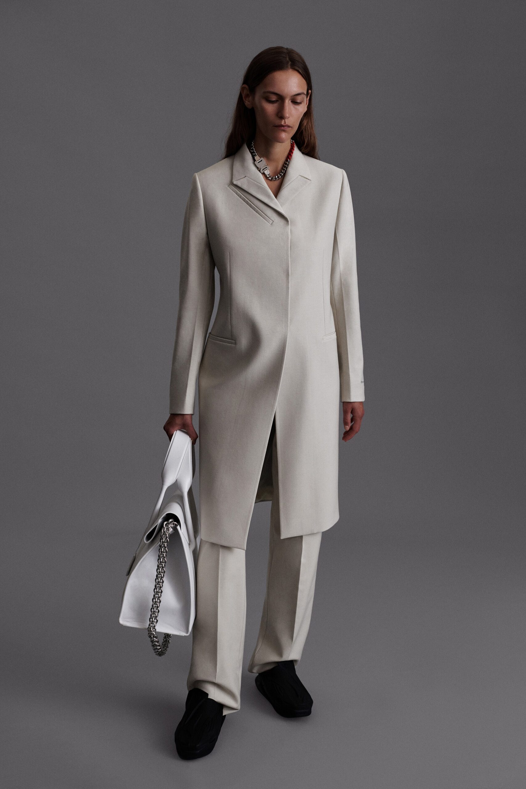 white wool long-sleeve collared tailored buttoned coat
