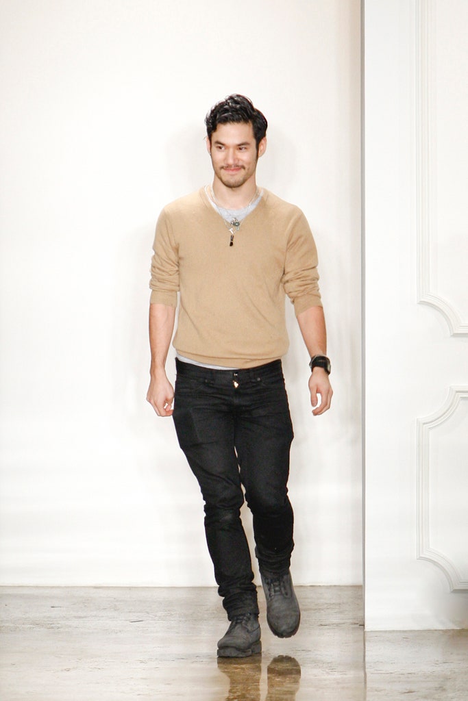 beige relaxed sweater with black pants