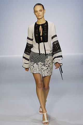 white embroidered blouse and mini skirt