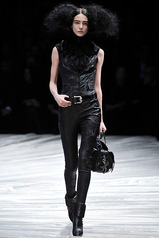 black silk ruffled top and leather pants
