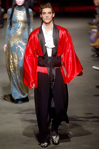 red silk coat with black pants