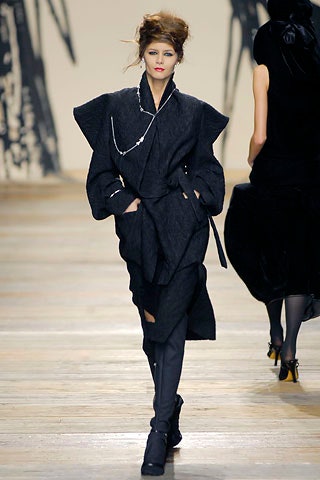 black structured coat with fitted pants