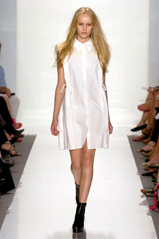 white relaxed mini dress with black boots
