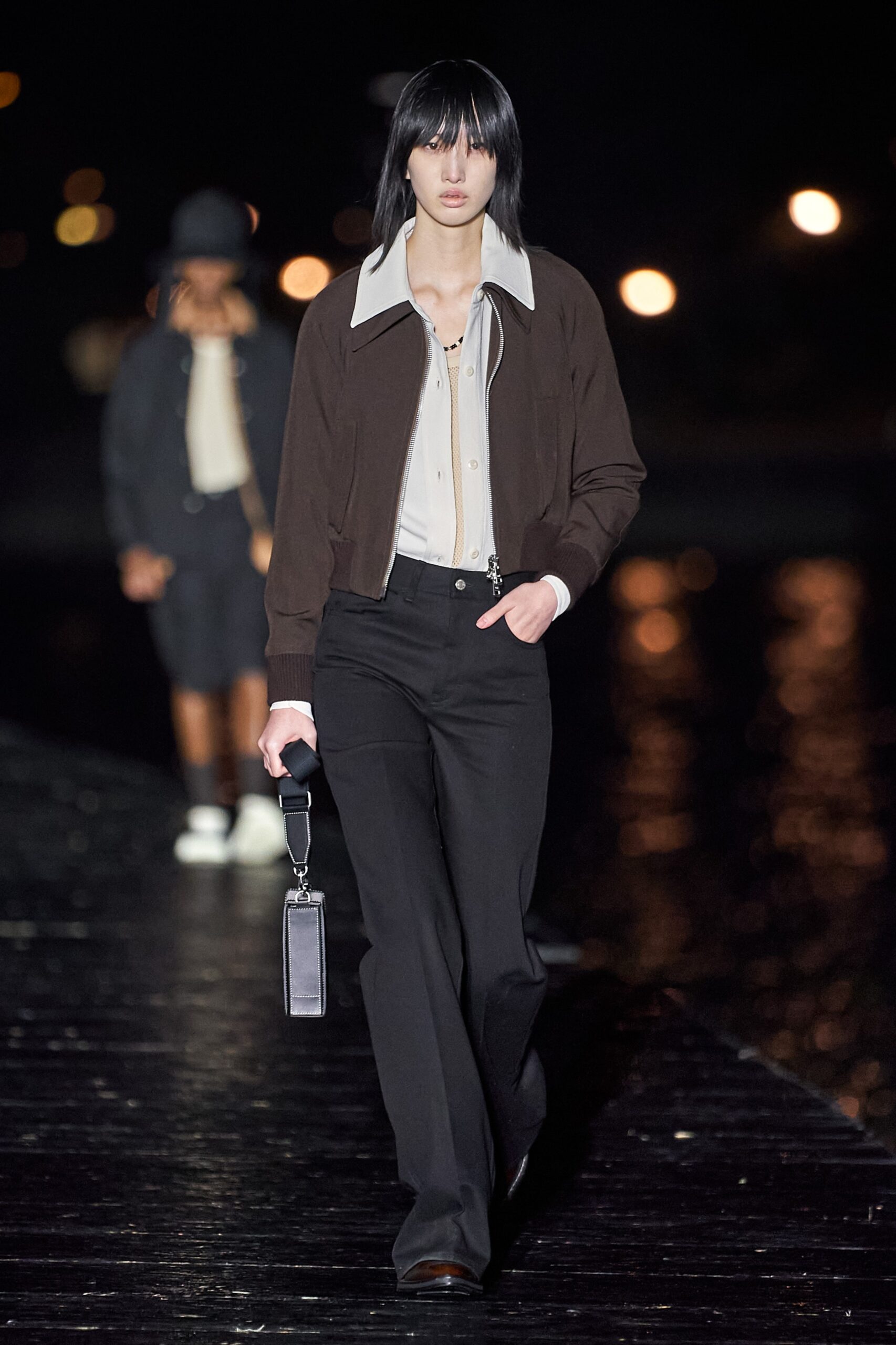 brown fitted jacket with black pants