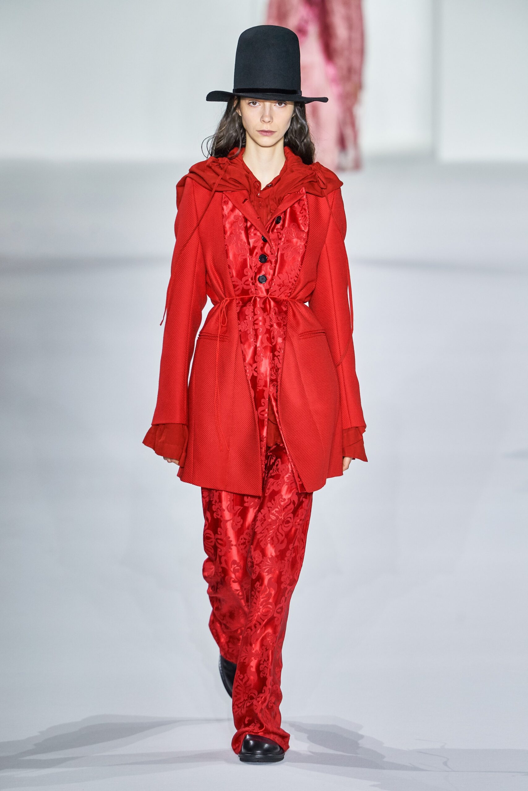red silk coat and jumpsuit