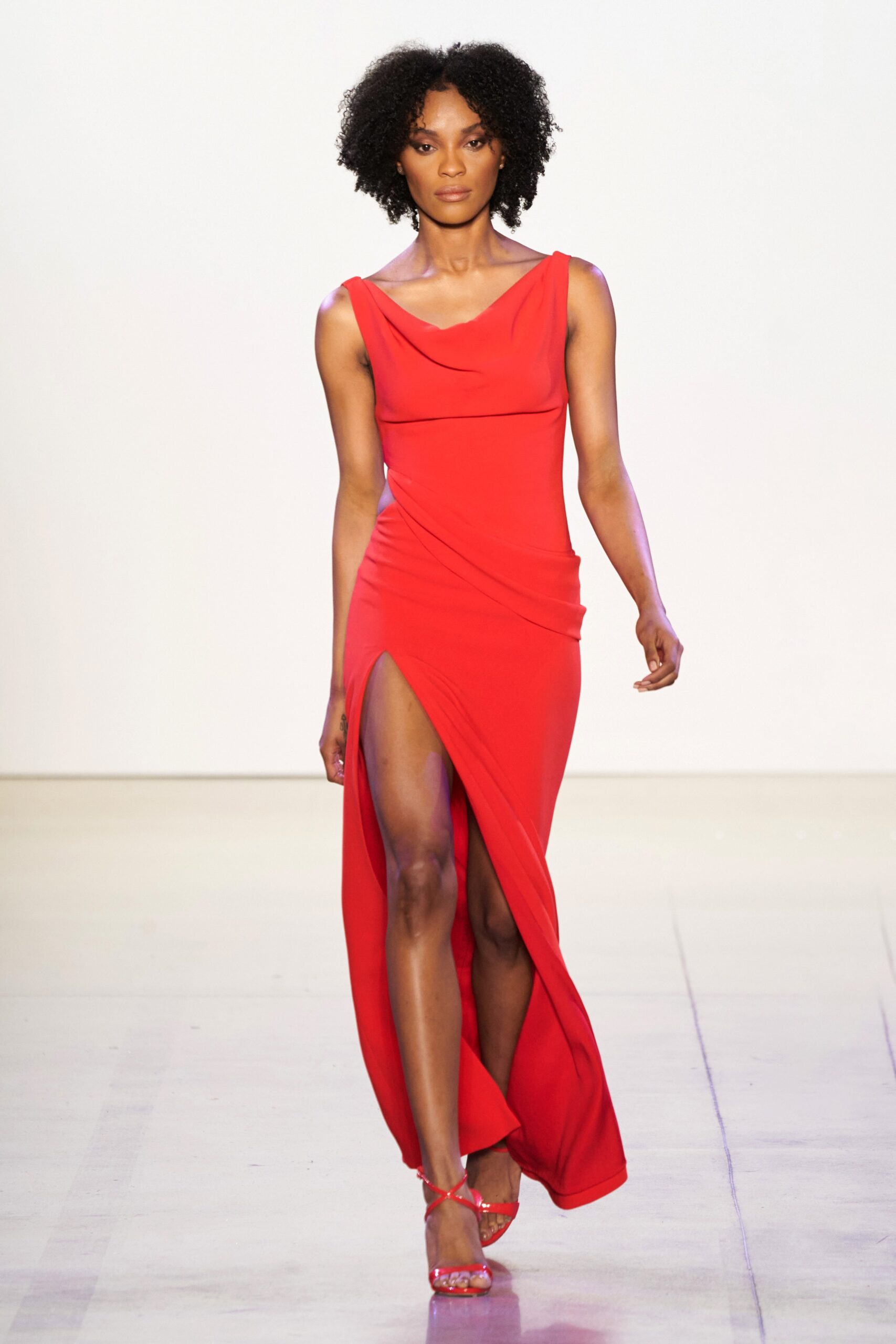 fitted red sleeveless gown