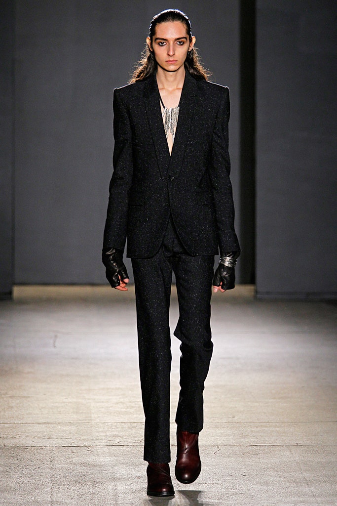 black tailored suit with gloves
